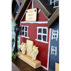 Skandynawskie drewniane miasteczko – wieszak z domkami handmade