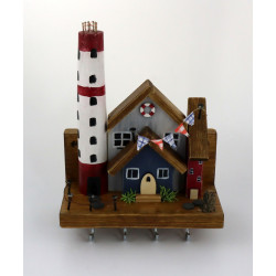 Nadmorskie drewniane miasteczko z latarnią – dekoracyjny wieszak