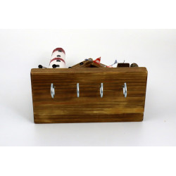 Nadmorskie drewniane miasteczko z latarnią – dekoracyjny wieszak